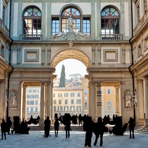 Visit the Uffizi Gallery, a three-minute stroll from this home