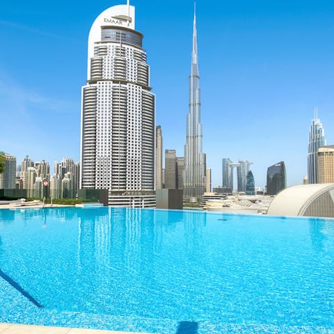 Cool off in the building's outdoor pool as you look out to the Burj Khalifa