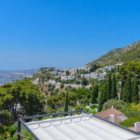 Take in spectacular views of the hills of Mijas and the Mediterranean Sea