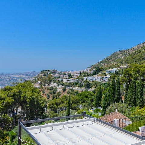 Take in spectacular views of the hills of Mijas and the Mediterranean Sea