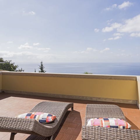 Lie back with a good book and relax on the sea-view balcony