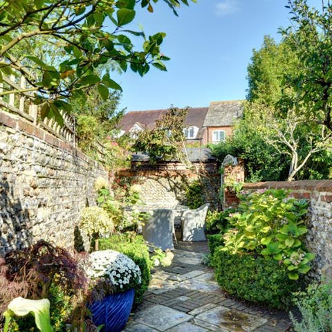 Sip Earl Grey and nibble cakes in your lush, walled garden