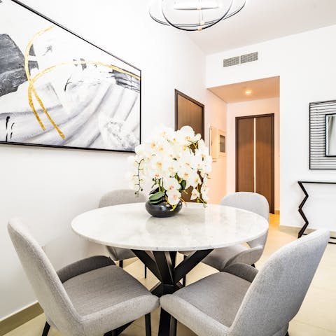 Sit down to nourishing meals at the stylish dining table