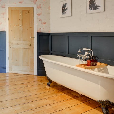 Unwind with a soak in the roll-top bath after a full day of exploring