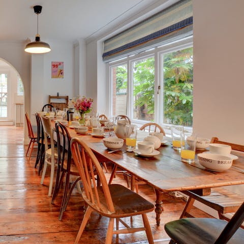 Share meals with family and friends at the long dining table 