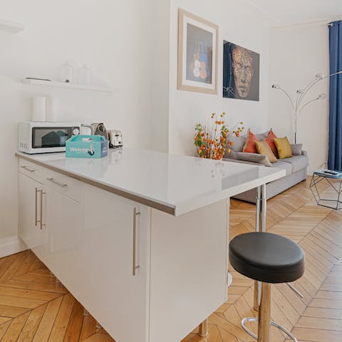 Enjoy your morning croissants at the sleek breakfast bar