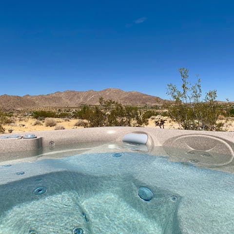 Relax in the hot tub with those views