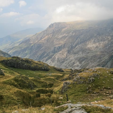 Climb up Snowdon mountain at Snowdonia National Park  – only a fifteen-minute drive away