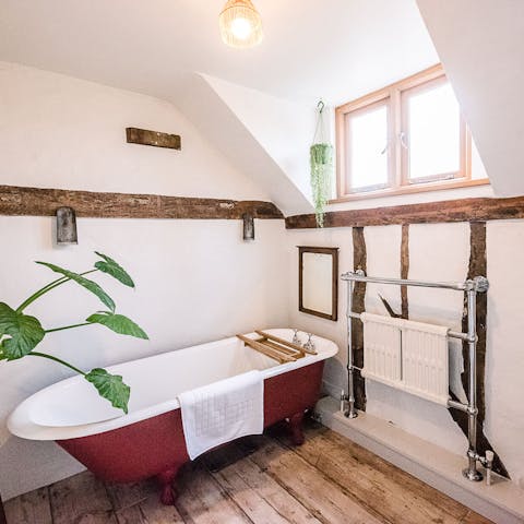Soak in the bathtub at the end of wholesome days in the fresh country air 