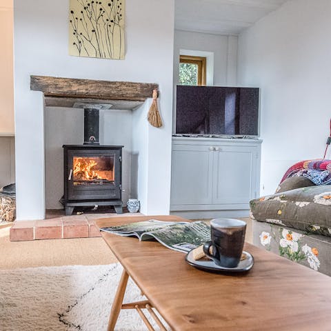 Curl up around the fireplace after a hike in the Suffolk countryside 