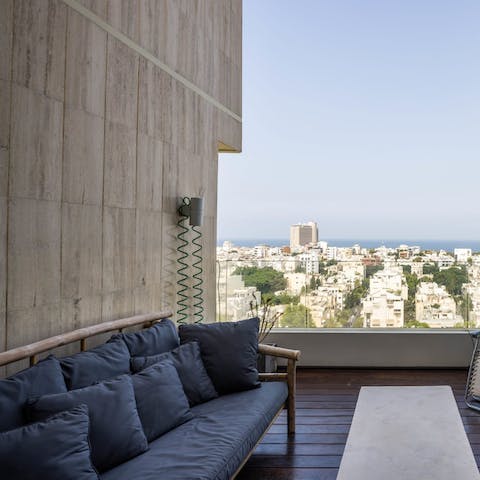 Savour a glass of Israeli wine on the private terrace