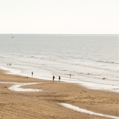 Relax on the soft sands of Zuiderstrand, a twelve-minute walk away