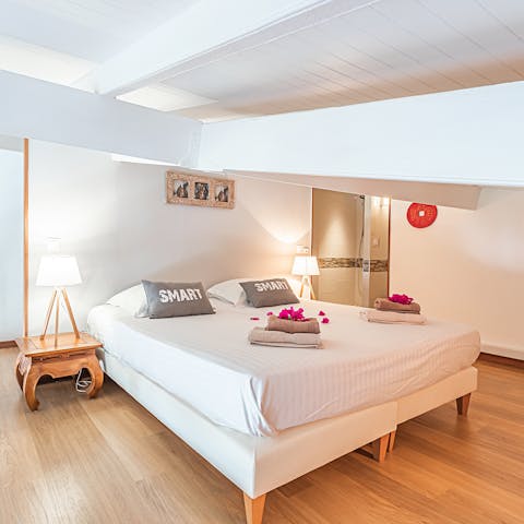 Enjoy a restful night's sleep in the charming mezzanine bedroom