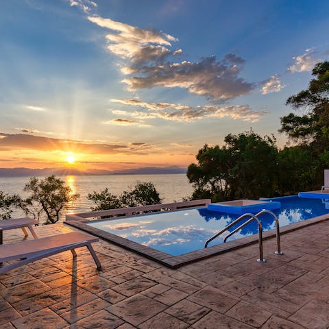 End the day with a sunset swim in the private pool