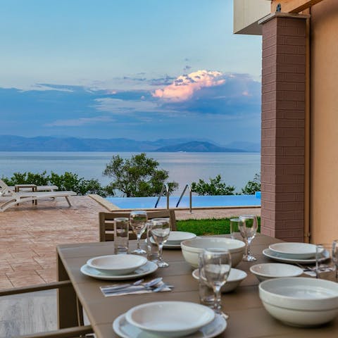 Look out to the Greek mainland from the outdoor dining terrace