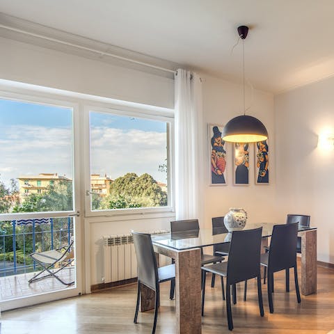 Share meals together around the dining table overlooking the city