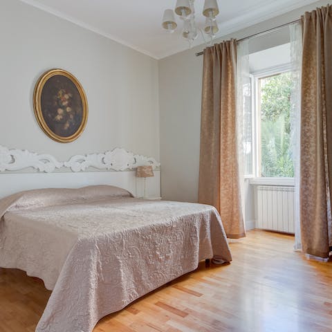 Get some rest in the pretty bedrooms after a busy day exploring the Eternal City