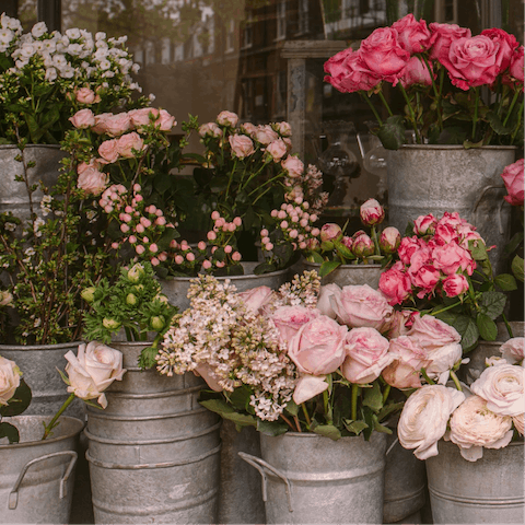 Pick up some flowers from Trionfale Market, a five-minute stroll from this home