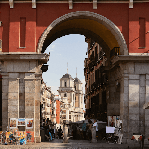 Visit the historic Plaza Mayor, a twelve-minute stroll from your doorstep