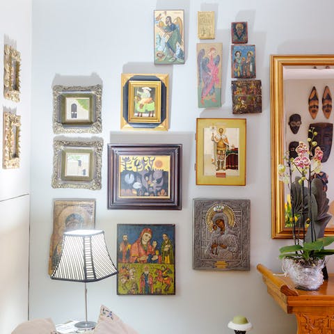 Admire the striking array of art and trinkets throughout the home