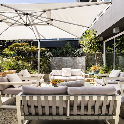 Relax in the shade of the outdoor lounge area