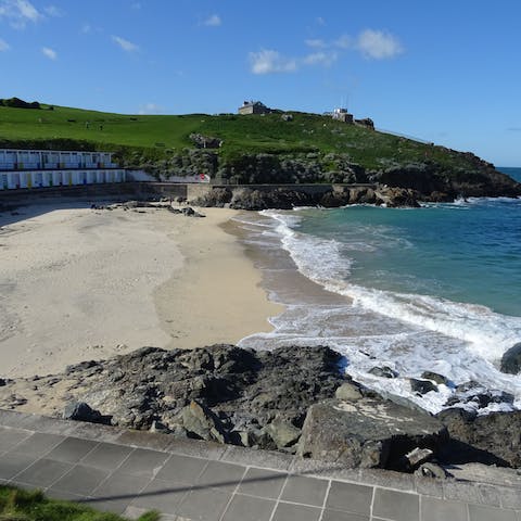 Pack a picnic and spend an afternoon on the sands of Porthgwidden Beach, ten minutes' walk away