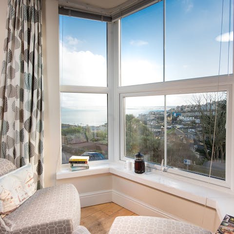 Watch the boats and swimmers in St Ives Bay from the living room window