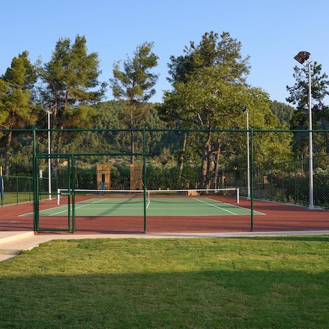 Get up early for a few sets of tennis on the private court