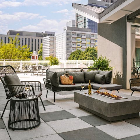 Mingle on the shared courtyard with its city vistas
