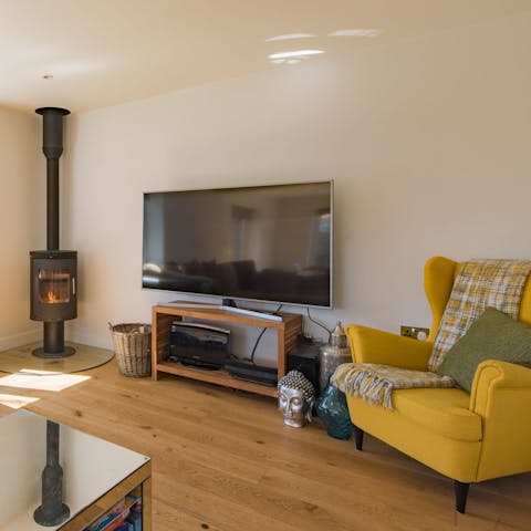 Snuggle up around the wood burner on winter nights and enjoy a movie