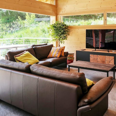 Grab a blanket and curl up on squashy leather sofas