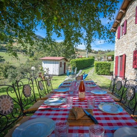 Feast on local bread, cheese, and wine in the garden