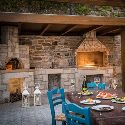 Fire up the pizza oven and barbecue for an alfresco feast