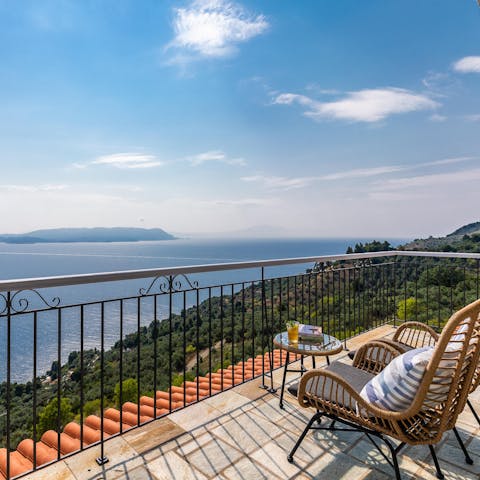 Enjoy breakfast on the balcony overlooking the Aegean Sea