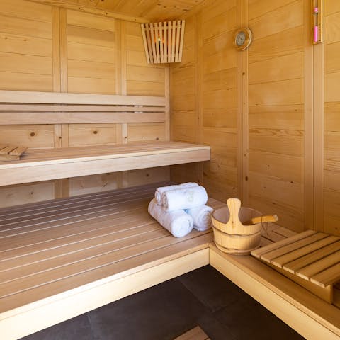 Enjoy a relaxing session in the private sauna