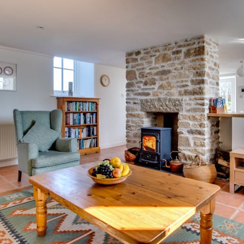 Curl up by the wood-burning fire with a good book and a glass of wine