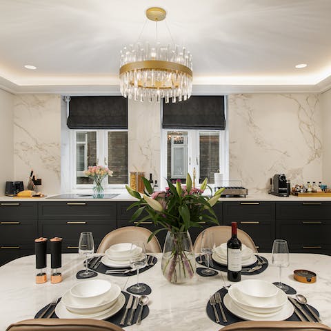 Gather for a delicious home-cooked meal around the sleek dining table