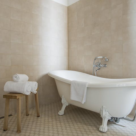 Relax and unwind with a soak in the bathtub