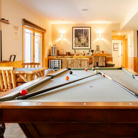 Play a round of pool or air hockey in the game room