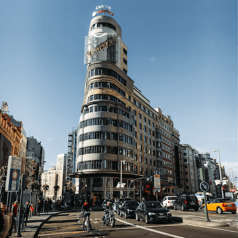 Treat yourself to some retail therapy along bustling Gran Vía, six minutes away on foot