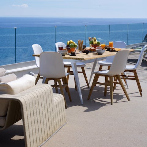 Make the most of the ample terrace with an epic sea view