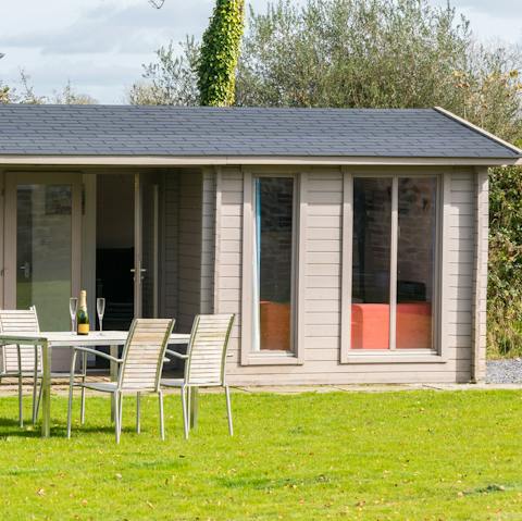 Take it easy in the comfy garden summerhouse