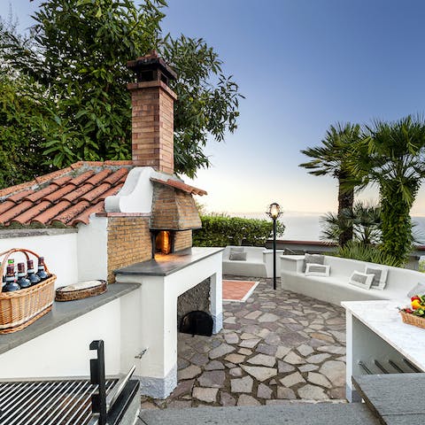 Get grilling in the home's luxury barbecue area