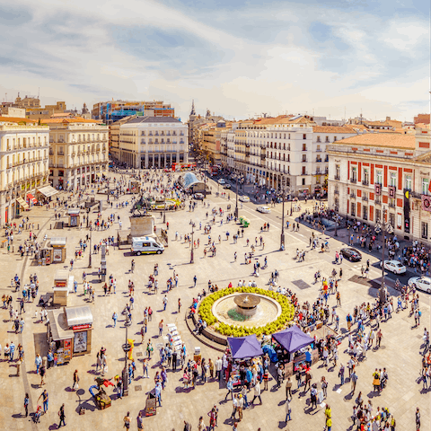Visit the beautiful Puerta del Sol square