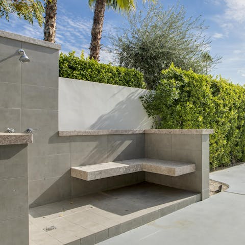 Cool off under the huge outdoor shower 