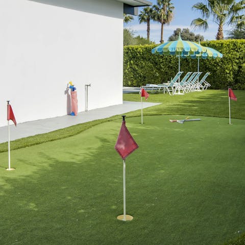 Practice your stroke on the putting green