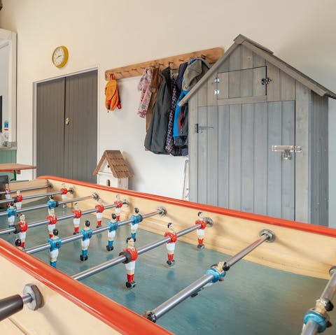 Play on the vintage foosball table found in the communal barn