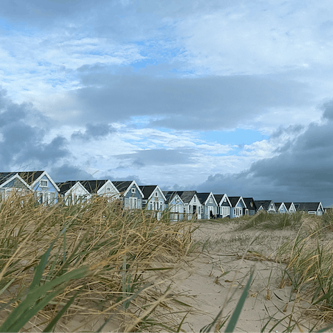 Spend the day along the Mudeford coastline, a fifteen-minute drive from your home