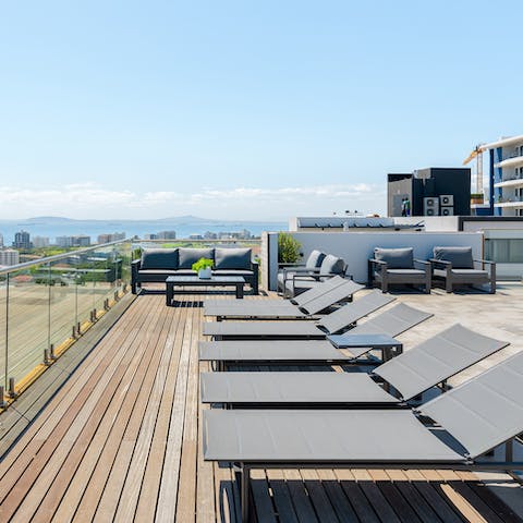 Lay back on one of the loungers on the shared terrace and drink in the wonderful view