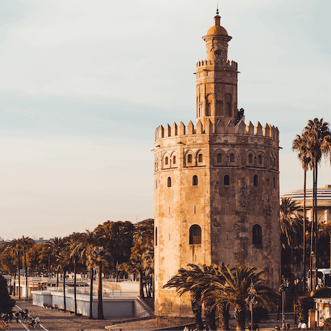Visit the historic Torre del Oro, a ten-minute walk from your building